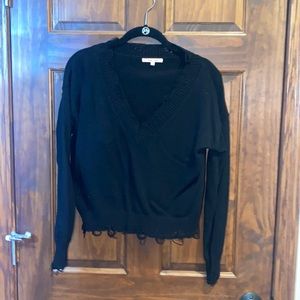 Distressed black sweater